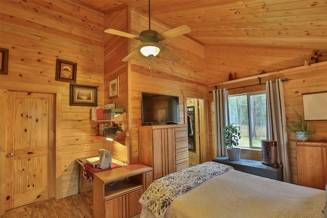 bedroom with ceiling fan, light hardwood / wood-style floors, high vaulted ceiling, and wooden ceiling