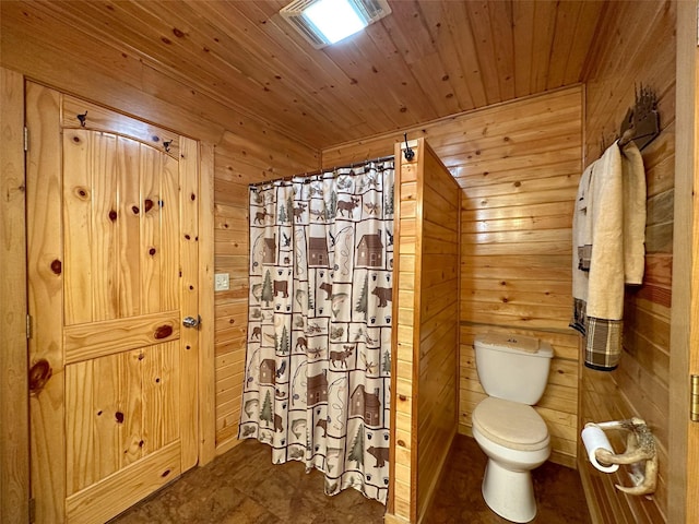 bathroom with toilet, wood ceiling, wood walls, and a shower with shower curtain