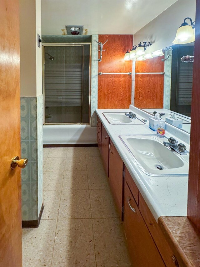 bathroom featuring tile patterned floors and vanity