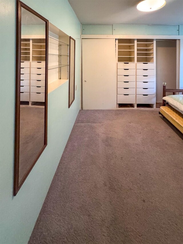 unfurnished bedroom with carpet flooring