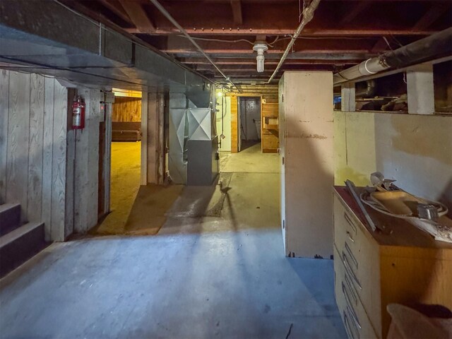 basement featuring heating unit