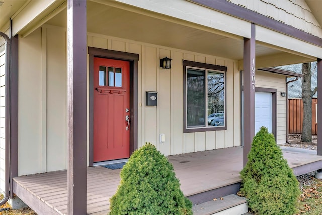 doorway to property featuring a porch