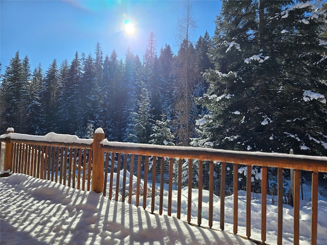 view of snow covered deck