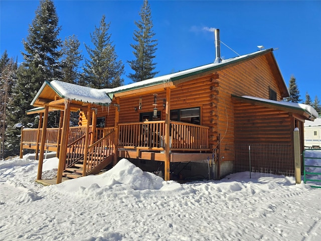 view of front of home with a porch and a deck