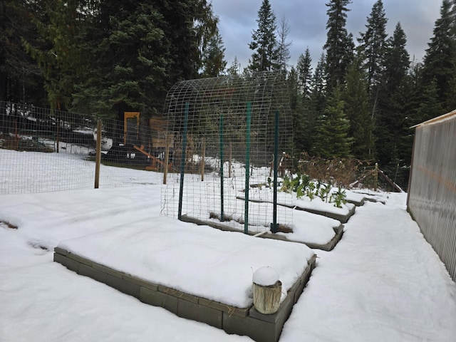 view of yard covered in snow