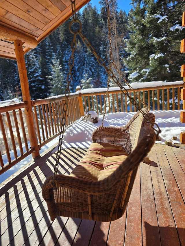 view of snow covered deck