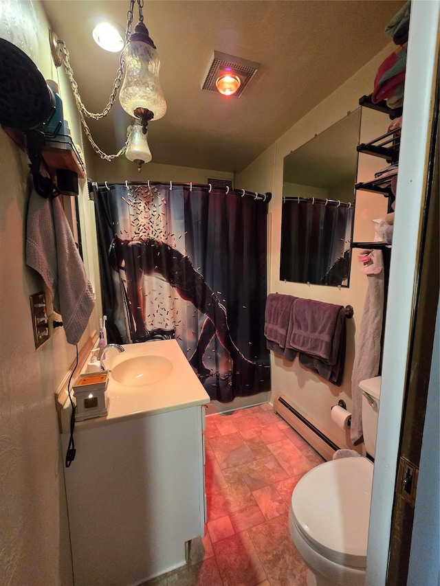 bathroom with vanity, curtained shower, toilet, and baseboard heating