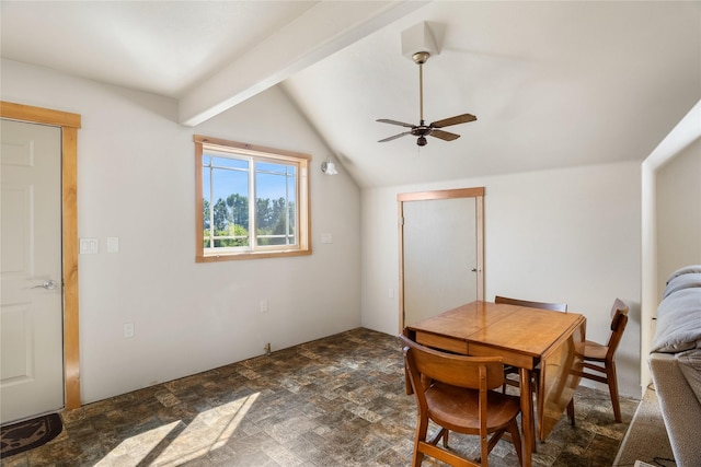 dining area featuring ceiling fan and lofted ceiling