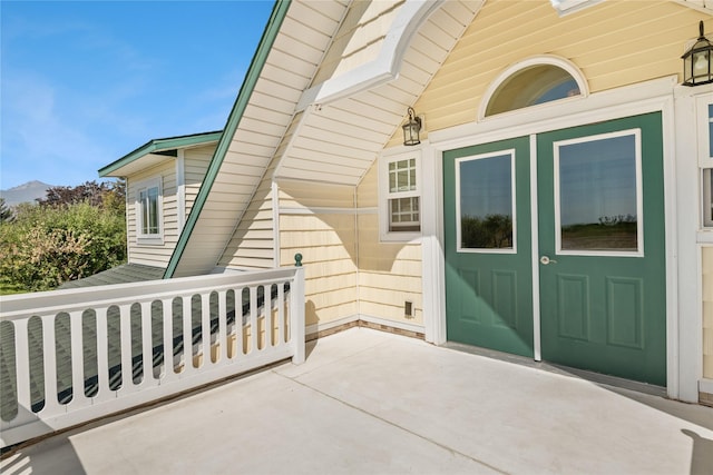 doorway to property featuring a patio