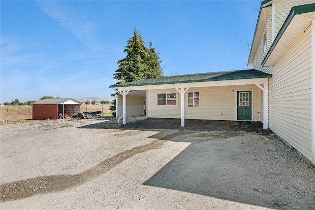 exterior space featuring a carport