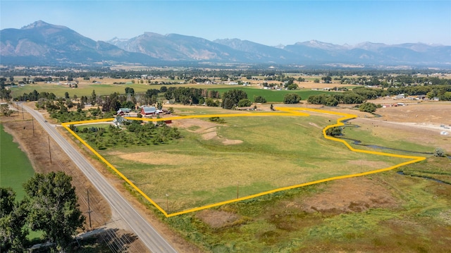 bird's eye view with a mountain view and a rural view