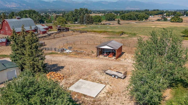 bird's eye view featuring a mountain view and a rural view