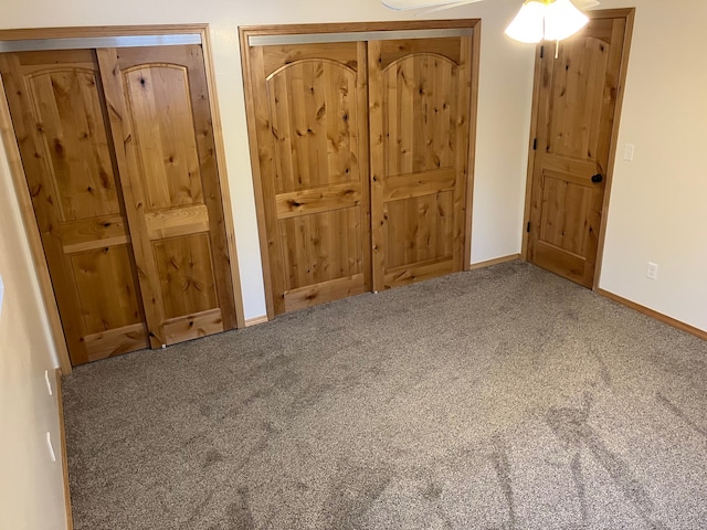 unfurnished bedroom with carpet