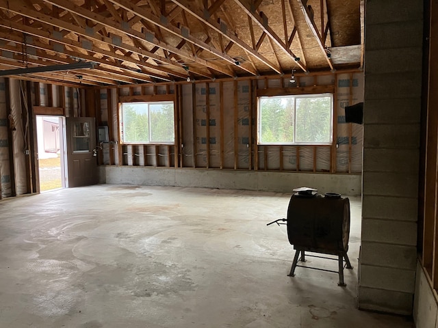 misc room with concrete flooring and a healthy amount of sunlight