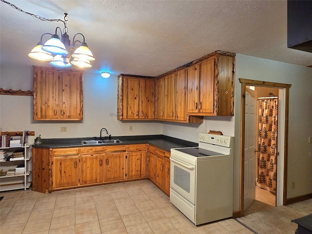 kitchen with an inviting chandelier, sink, hanging light fixtures, electric range, and a textured ceiling