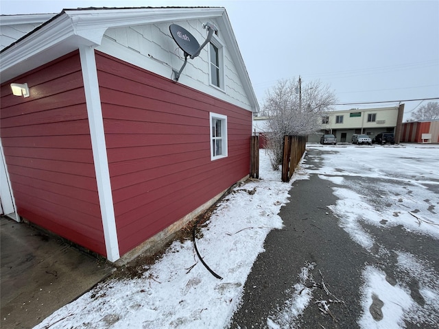 view of snow covered property