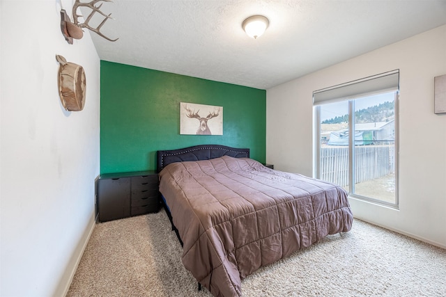 bedroom with light carpet