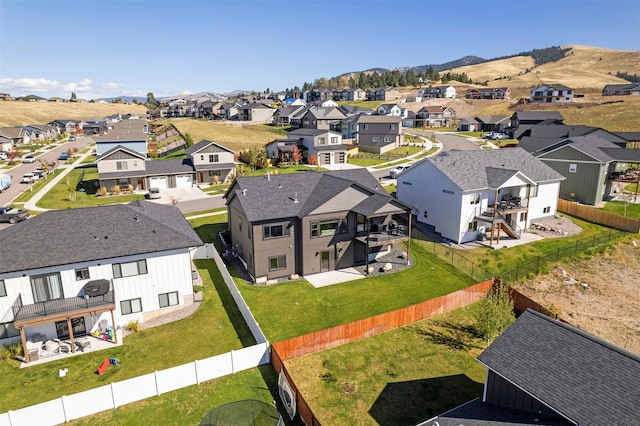 birds eye view of property featuring a mountain view