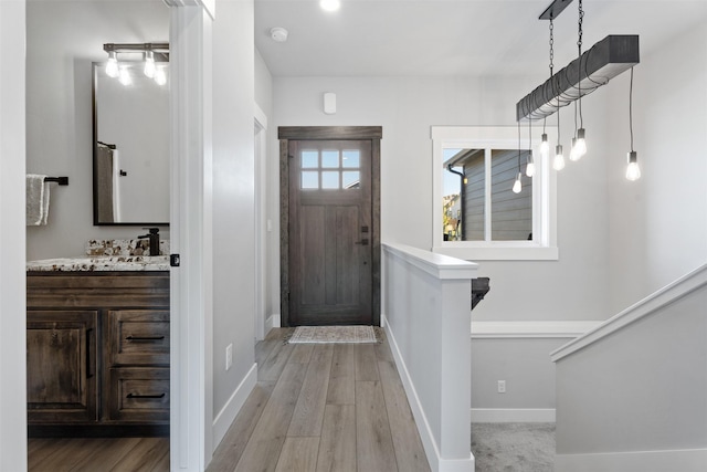 entrance foyer featuring light hardwood / wood-style flooring