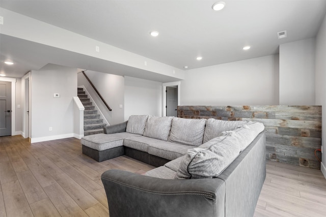 living room with light hardwood / wood-style floors