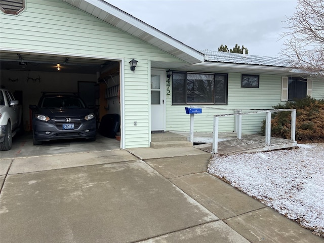 view of front of property with a garage