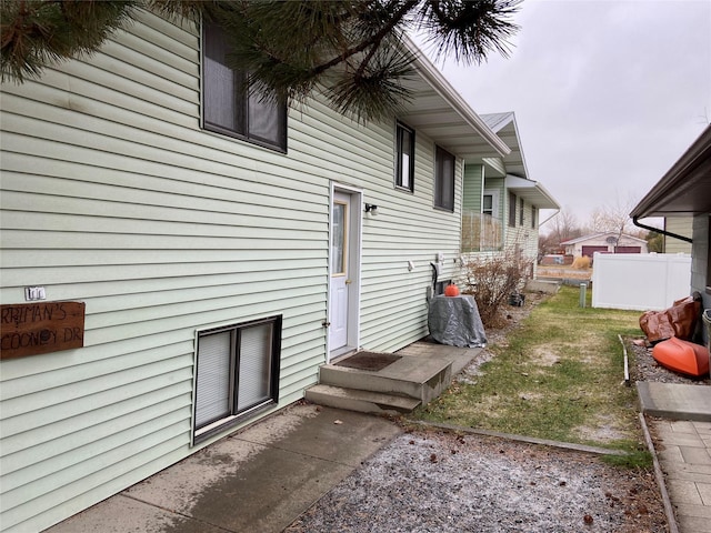 view of home's exterior featuring a yard