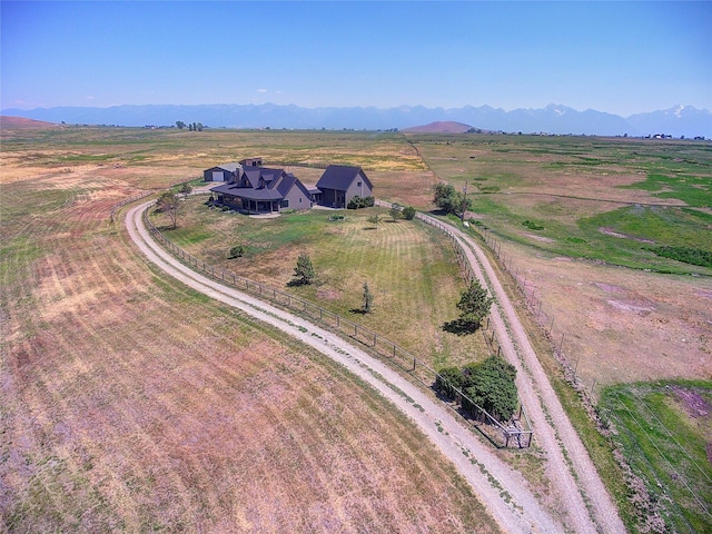 bird's eye view featuring a mountain view and a rural view