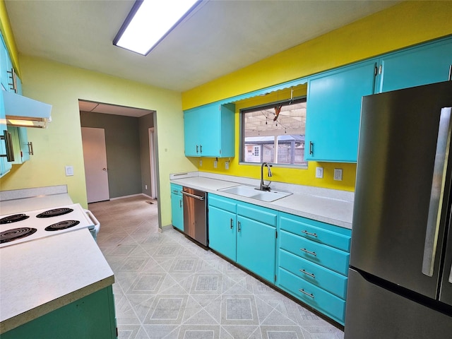 kitchen with sink, blue cabinets, and stainless steel appliances