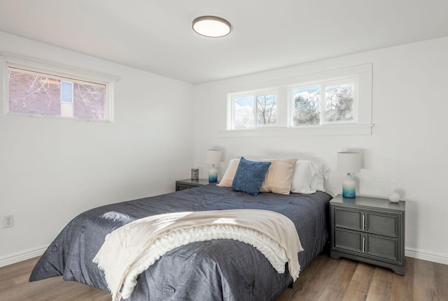 bedroom featuring hardwood / wood-style flooring