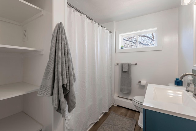 bathroom with baseboard heating, toilet, hardwood / wood-style flooring, vanity, and a shower with shower curtain