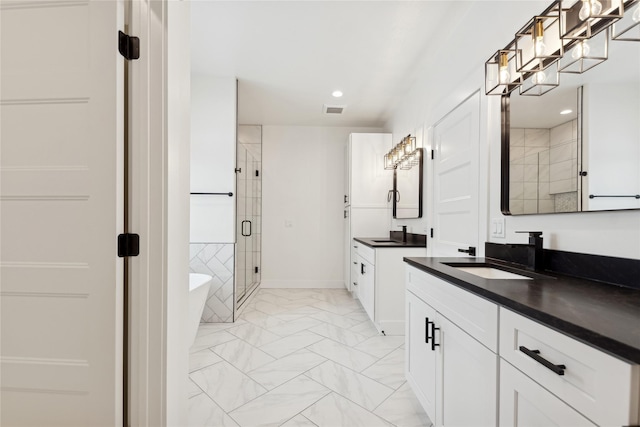 bathroom with two vanities, a sink, visible vents, marble finish floor, and a shower stall