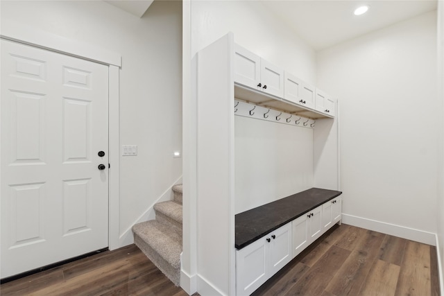 mudroom with recessed lighting, dark wood finished floors, and baseboards