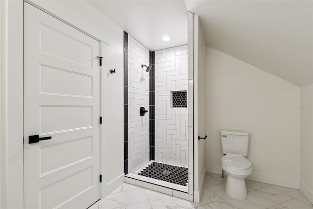 bathroom with a stall shower, marble finish floor, toilet, and baseboards