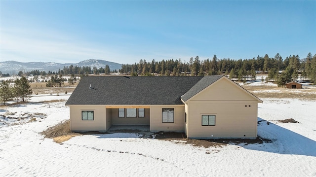 view of front of house with a mountain view