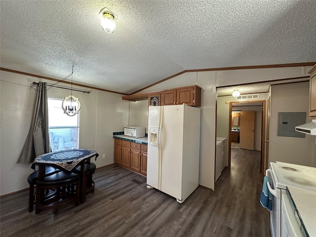 kitchen featuring decorative light fixtures, lofted ceiling, dark hardwood / wood-style flooring, crown molding, and white appliances