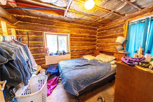 bedroom with log walls