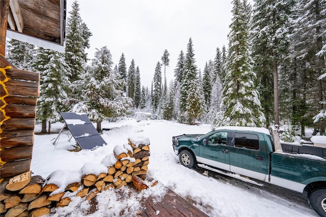 view of yard covered in snow