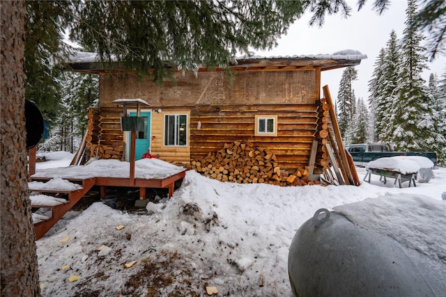 view of snow covered property