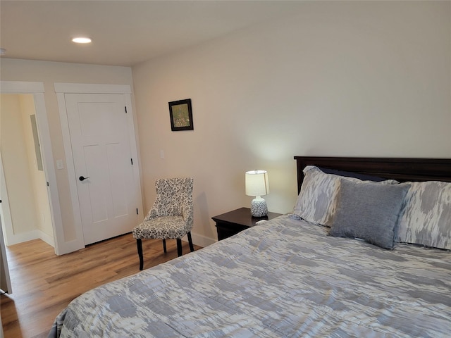 bedroom featuring wood-type flooring