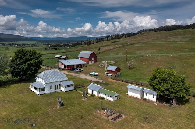 bird's eye view featuring a mountain view and a rural view