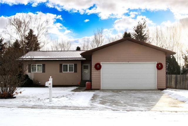 single story home with a garage