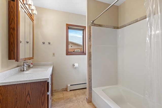 bathroom with vanity, shower / bath combination with curtain, and a baseboard radiator