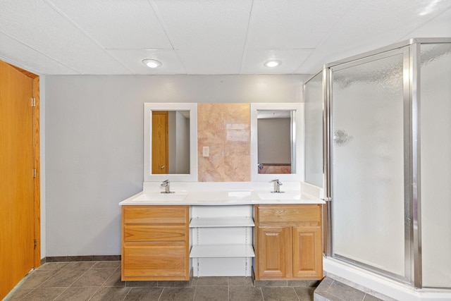 bathroom with vanity and an enclosed shower