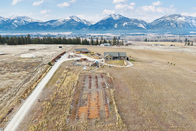 mountain view featuring a rural view