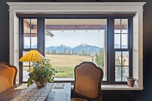 unfurnished room with a mountain view