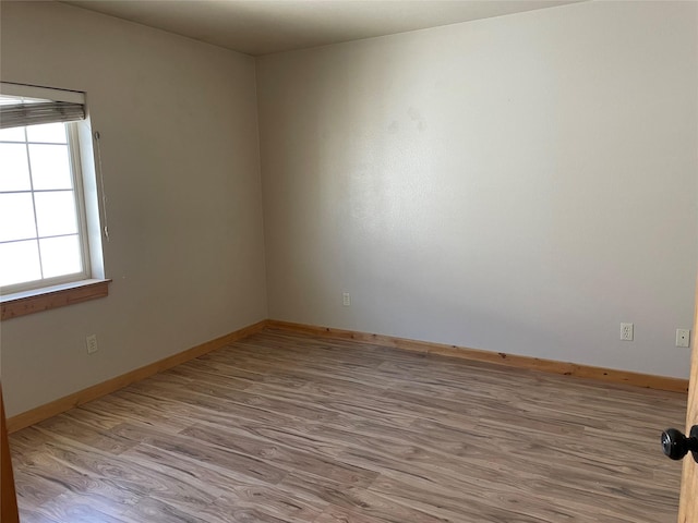 empty room featuring light wood-type flooring