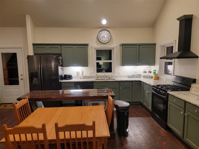 kitchen with light stone countertops, dark wood-type flooring, sink, black appliances, and range hood