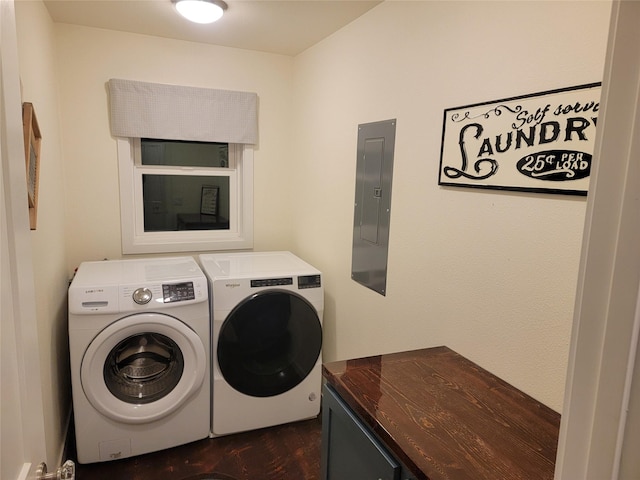 laundry room featuring separate washer and dryer and electric panel