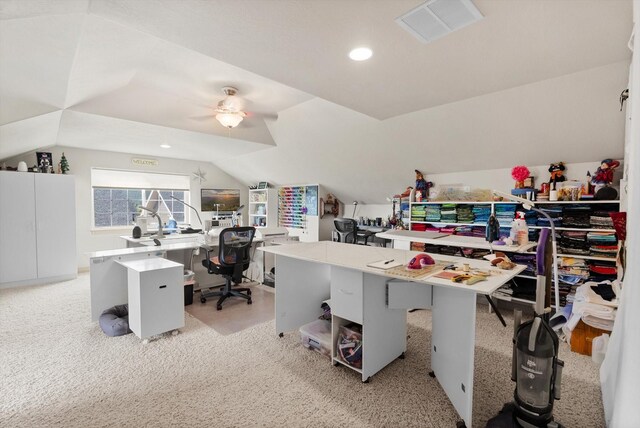 carpeted home office with ceiling fan and lofted ceiling