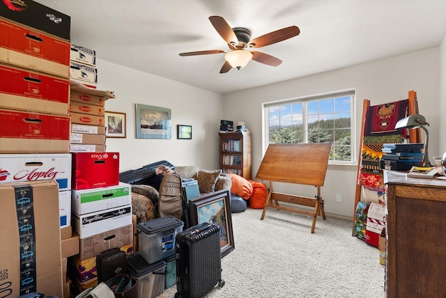 office featuring ceiling fan and light colored carpet